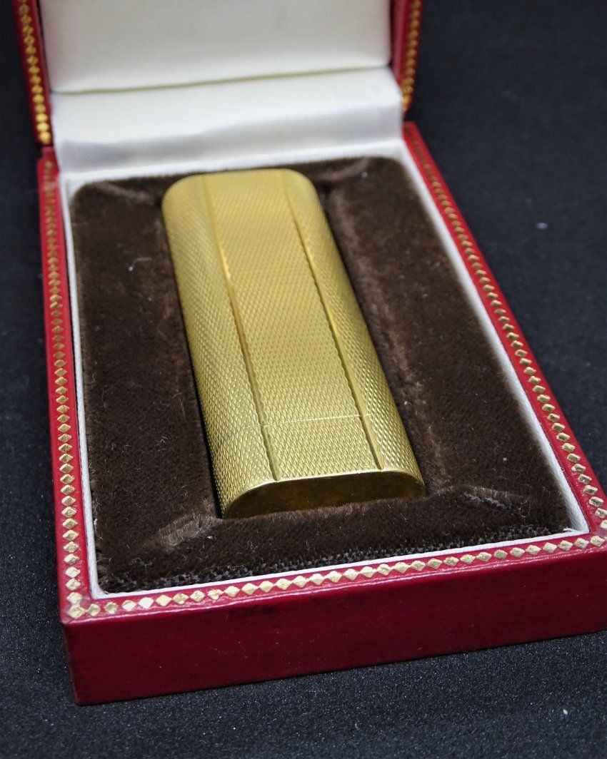 Encendedor Cartier chapado en oro   estuche original