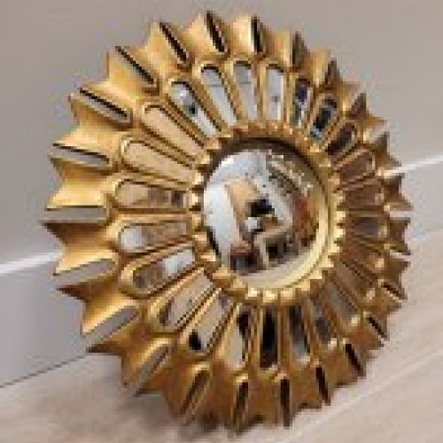 Espejo convexo, marco dorado con forma de sol